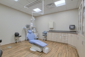 Photo of an exam room in a recently completed dental office construction project.