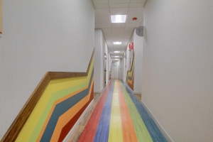 Photo of a colorful pediatric dental office hallway.