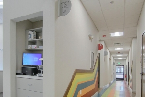 Photo of a colorful pediatric dental office hallway.