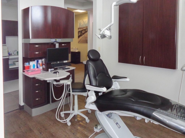 Photo of an exam room in a recently completed dental office construction project.