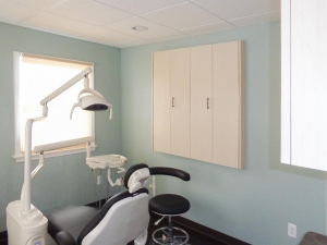 Photo of an exam room in a recently completed dental office construction project.