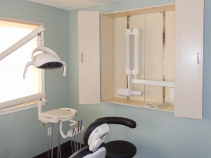 Photo of an exam room in a recently completed dental office construction project.