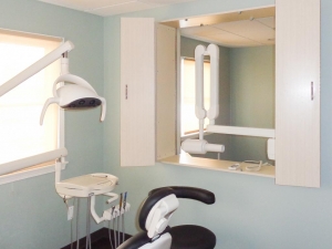 Photo of an exam room in a recently completed dental office construction project.