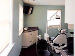 Photo of an exam room in a recently completed dental office construction project.
