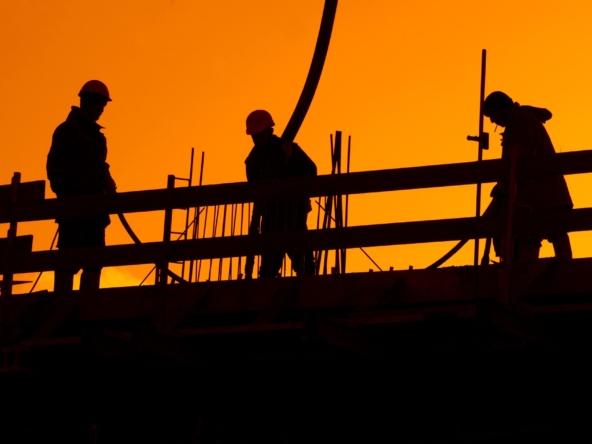 Silhouette of construction workers