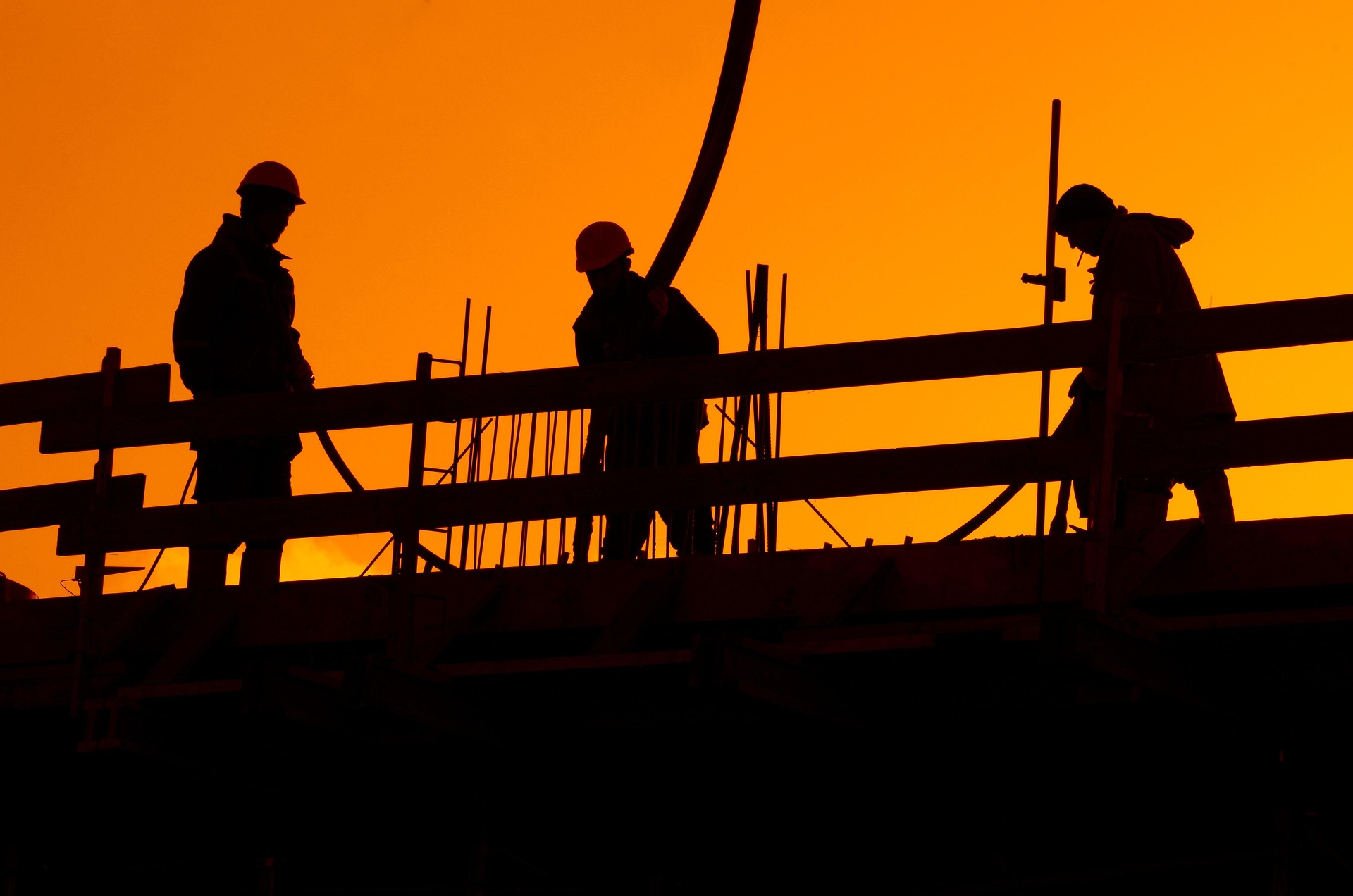 Silhouette of construction workers
